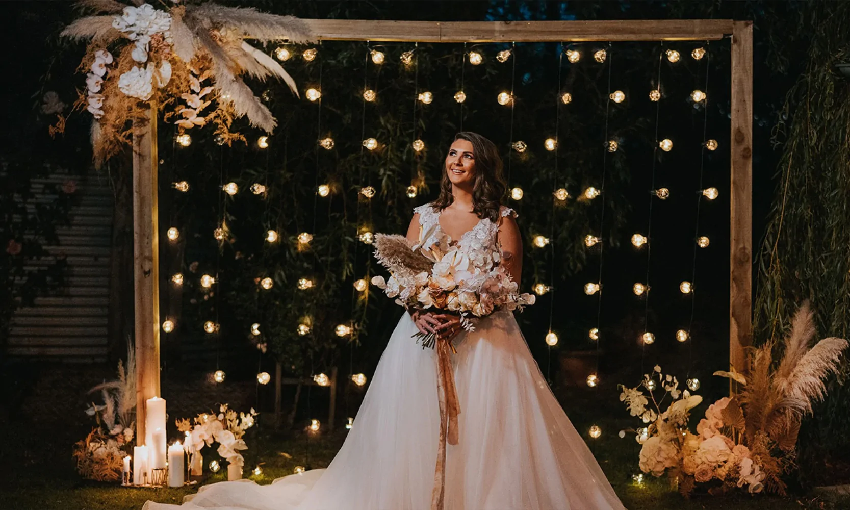 Reclaimed Frame with Full Festoons at an outdoor summer wedding.