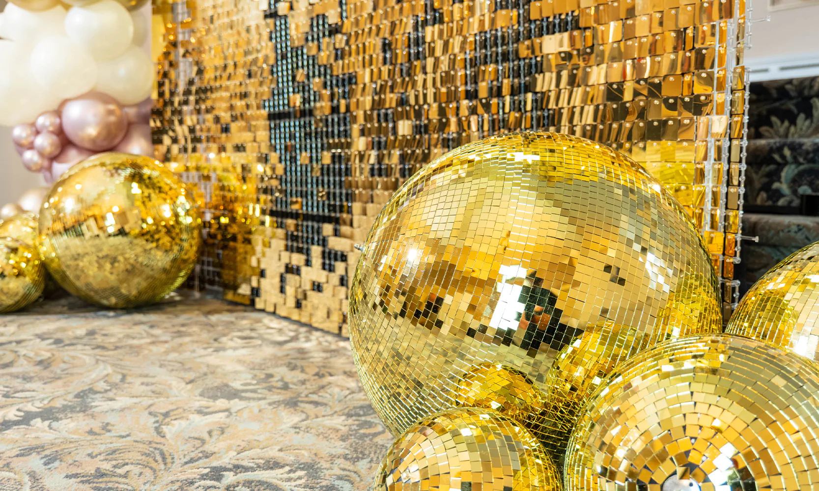 Gold Mirror Balls for a Christmas Party by Elizabeth James Events