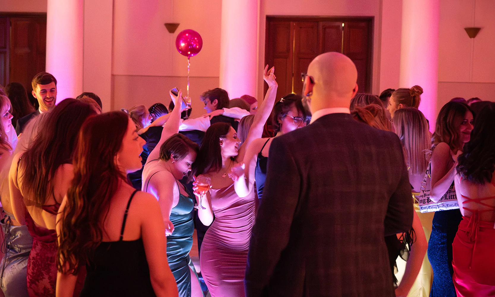 Guests dancing at a party.