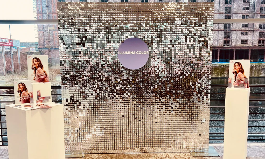 Wella - Silver Sequin Wall with Branded Acrylic Disc