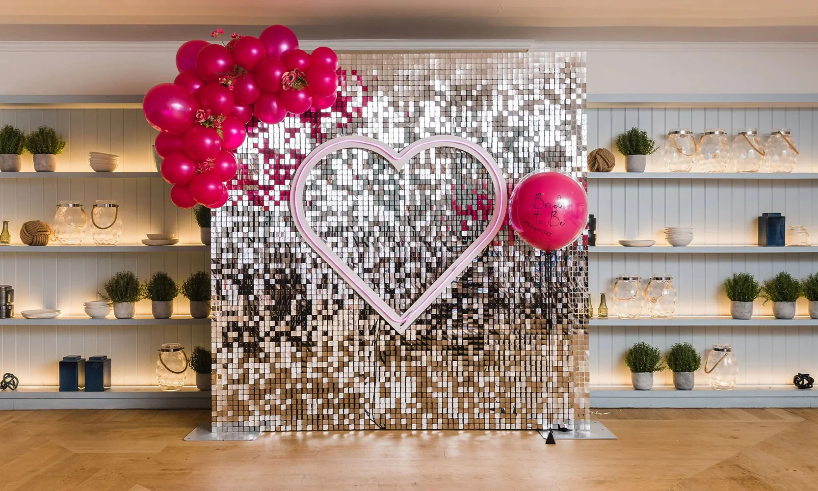 Silver Sequin Wall with Balloons and Neon Heart for hire from Elizabeth James Events