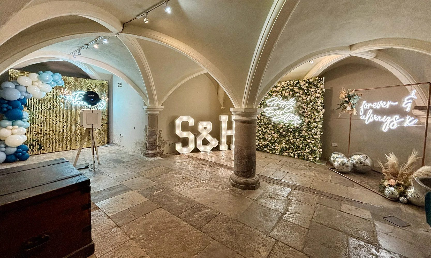 Hired event decor in a space for a wedding.