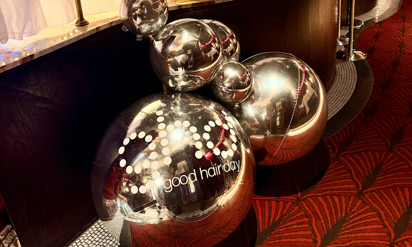 Custom branded silver sheres for a GHD corporate event.