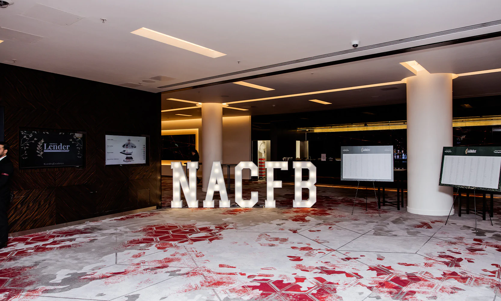 Corporate event with with light-up letters spelling the brand name.